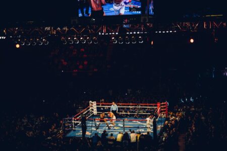 A boxing ring with people watching