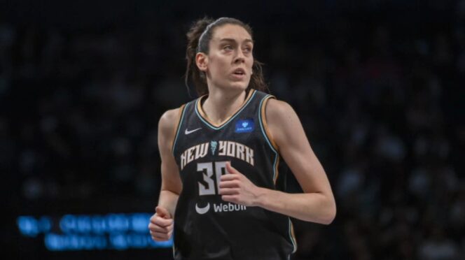 New York Liberty guard Sabrina Ionescu drives against the Washington Mystics at Barclays Center on June 19, 2026