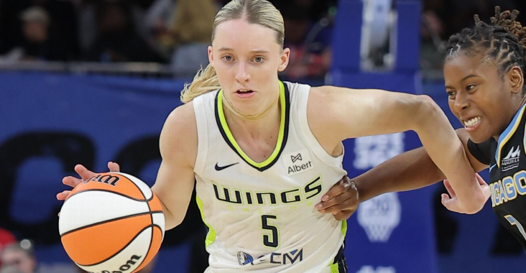 New York Liberty guard drives against the Dallas Wings defense during a WNBA game on July 20, 2026