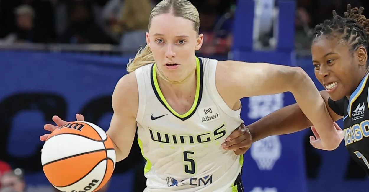 New York Liberty guard drives against the Dallas Wings defense during a WNBA game on July 20, 2026